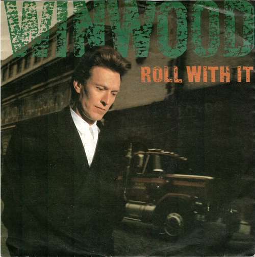 Cover Steve Winwood - Roll With It (7, Single) Schallplatten Ankauf