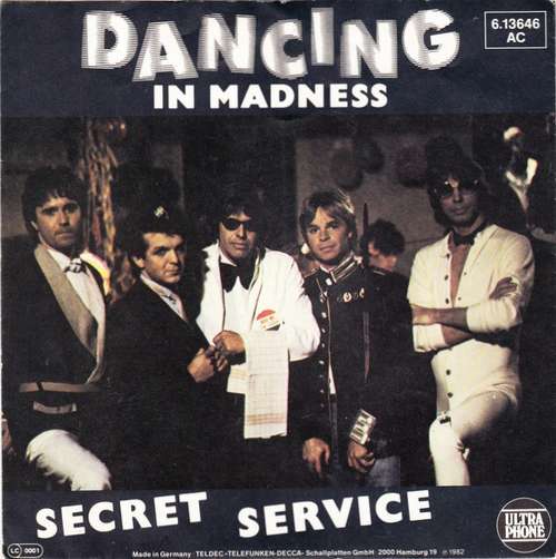 Cover Secret Service - Dancing In Madness (7, Single) Schallplatten Ankauf