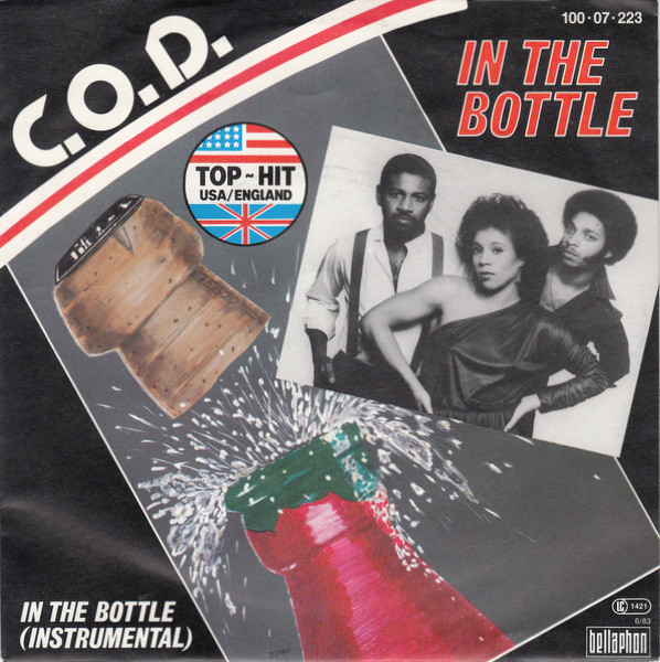 Cover C.O.D. - In The Bottle (7, Single) Schallplatten Ankauf