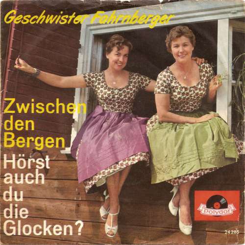 Cover Die Geschwister Fahrnberger - Zwischen Den Bergen / Hörst Auch Du Die Glocken? (7, Single) Schallplatten Ankauf